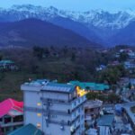 Palampur in monsoon with lush tea gardens, misty hills, and scenic views from BlissPalampur
